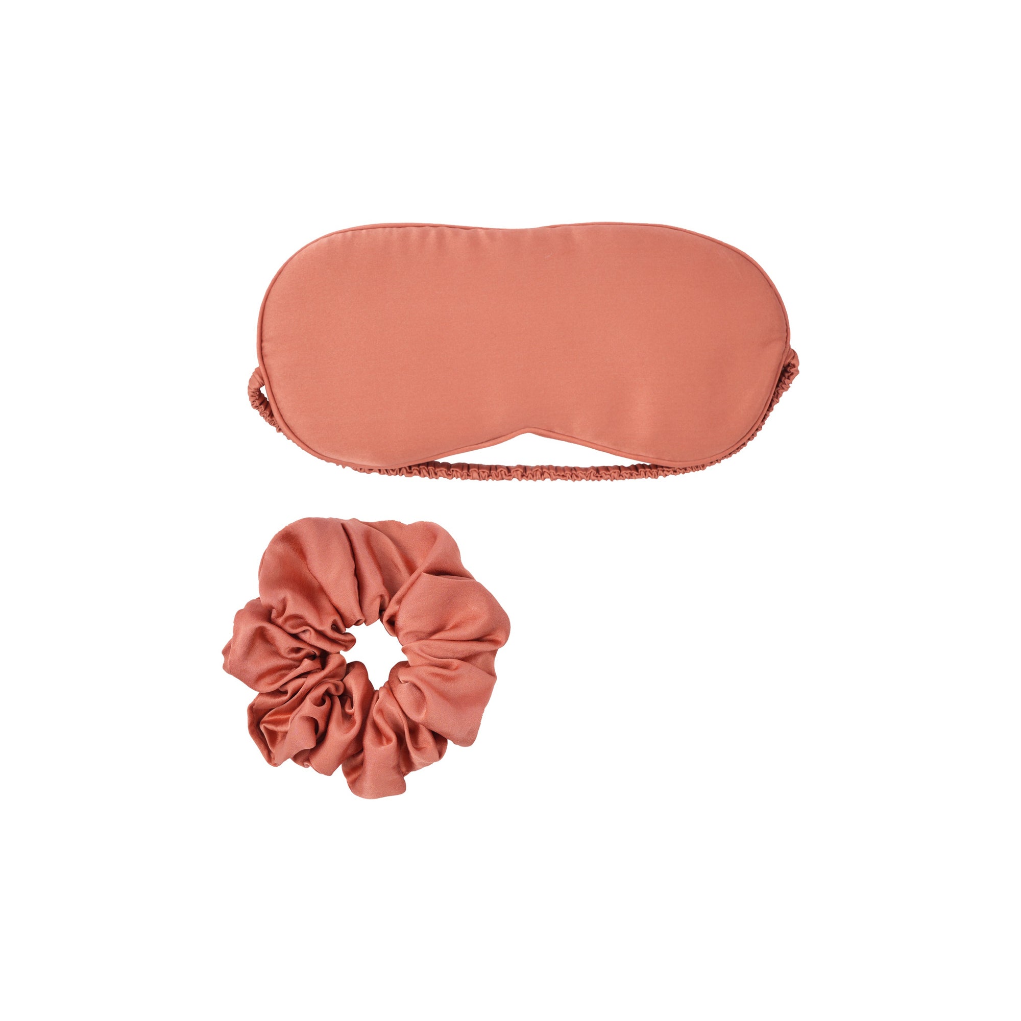 Plant-dyed mulberry silk sleep mask and scrunchies in Saffron color, handmade in Bali