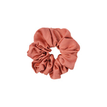 Plant-dyed mulberry silk scrunchie in Saffron color, gentle on hair