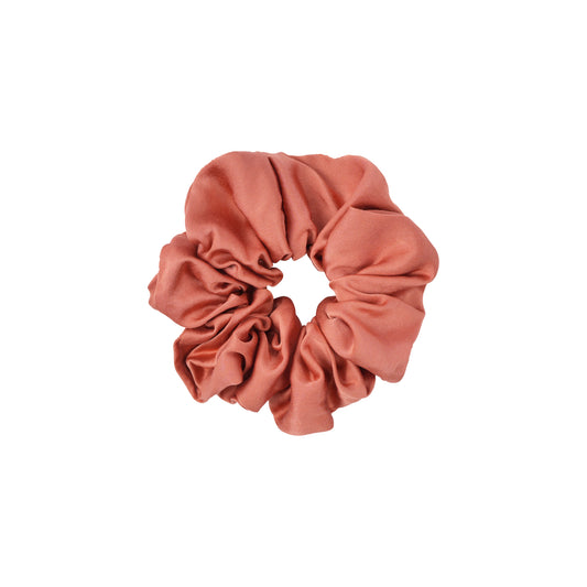 Plant-dyed mulberry silk scrunchie in Saffron color, gentle on hair